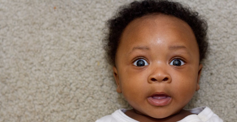 babies crawling on new carpet