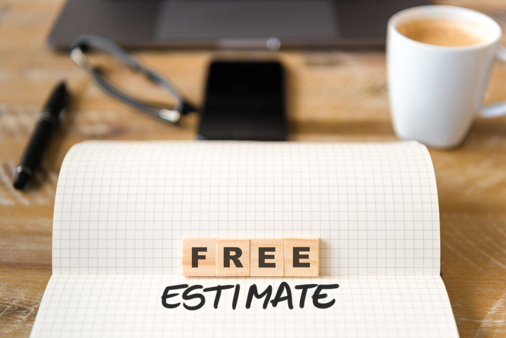 free estimate blocks on paper on desk